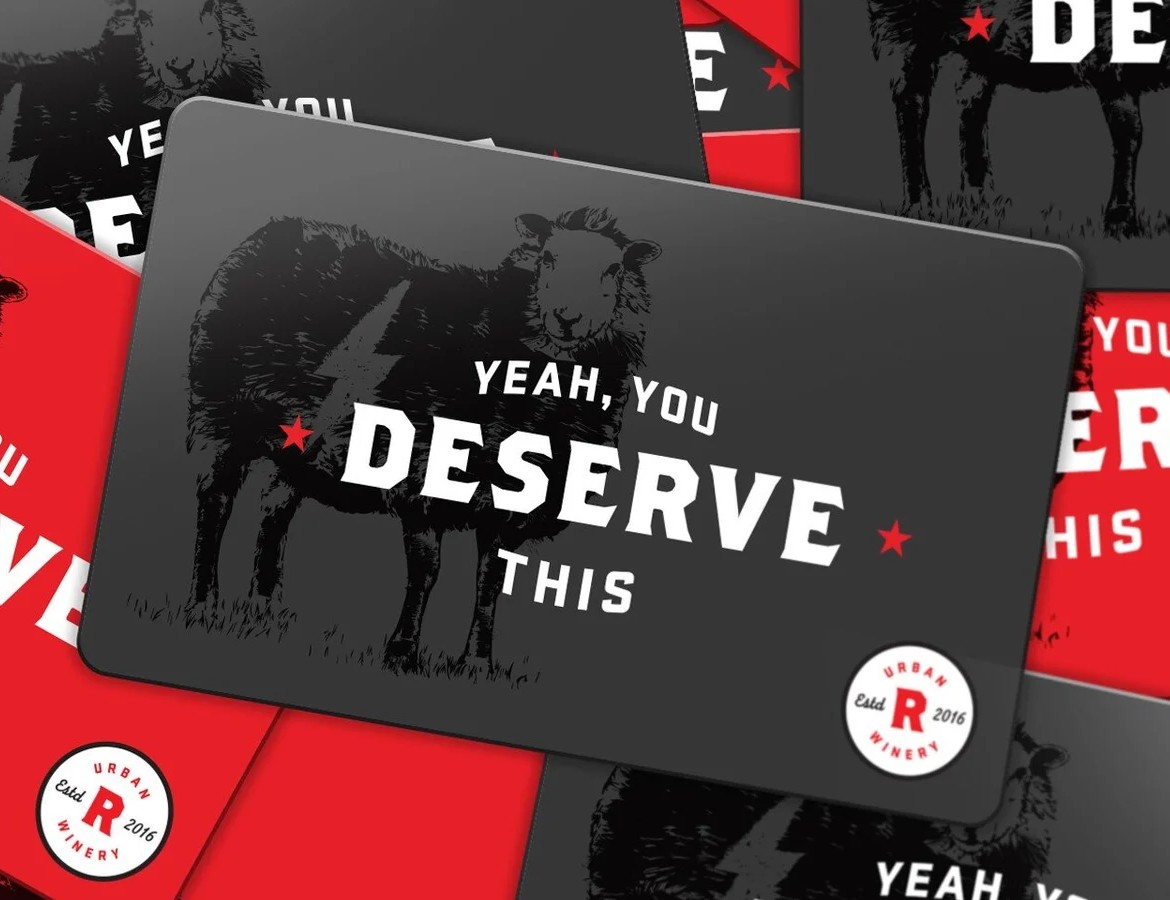 Revel Urban Winery gift card — black card with the Black Sheep bolt mark and Yeah, You Deserve This lettering